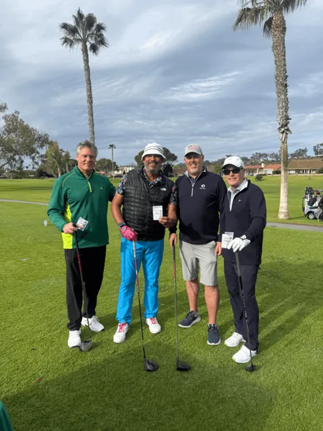 Group of golfers with birdiegum